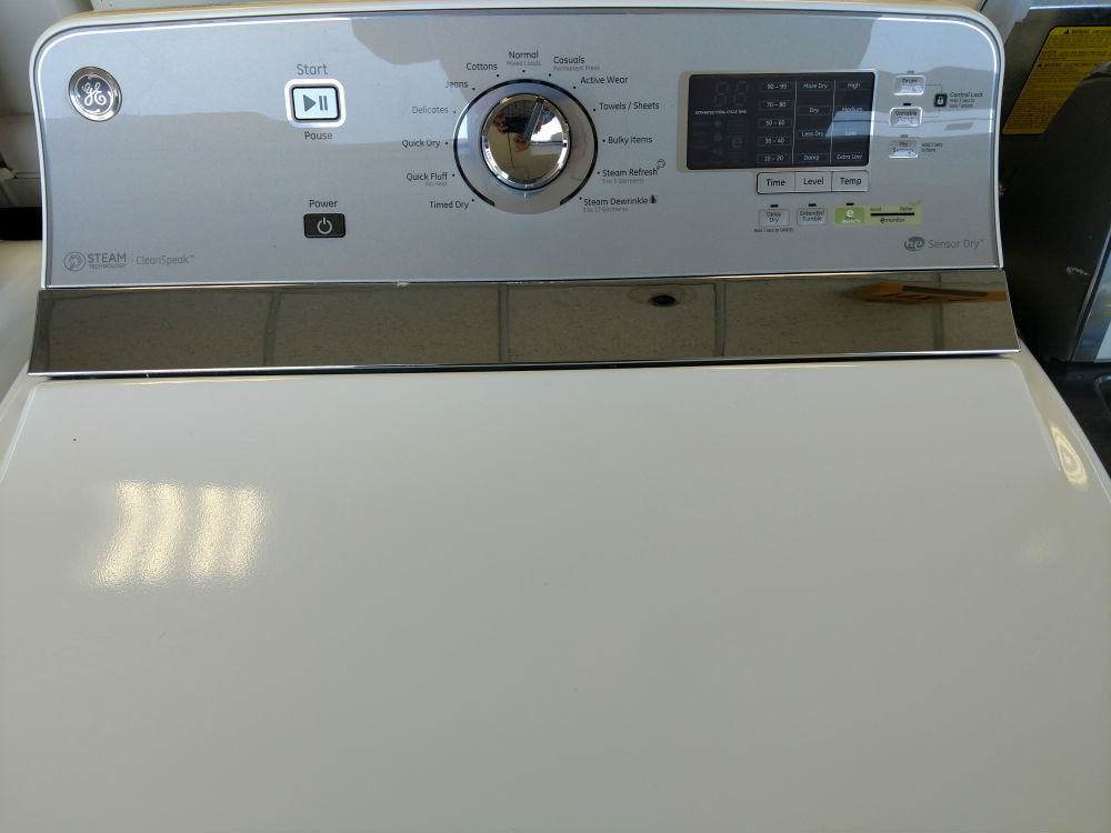 White top load washer dryer