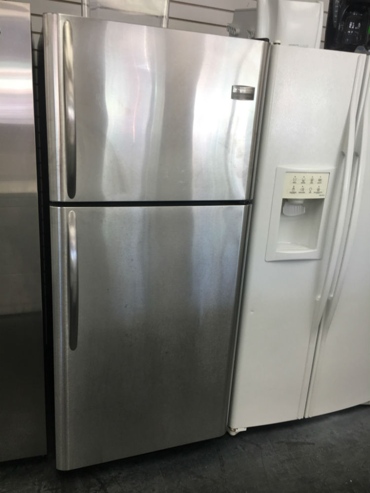 Used dark grey top freezer refrigerator