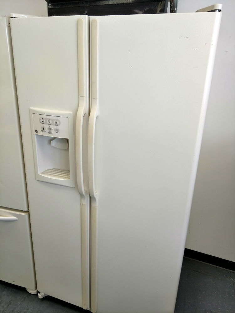 White side-by-side fridge with water dispenser